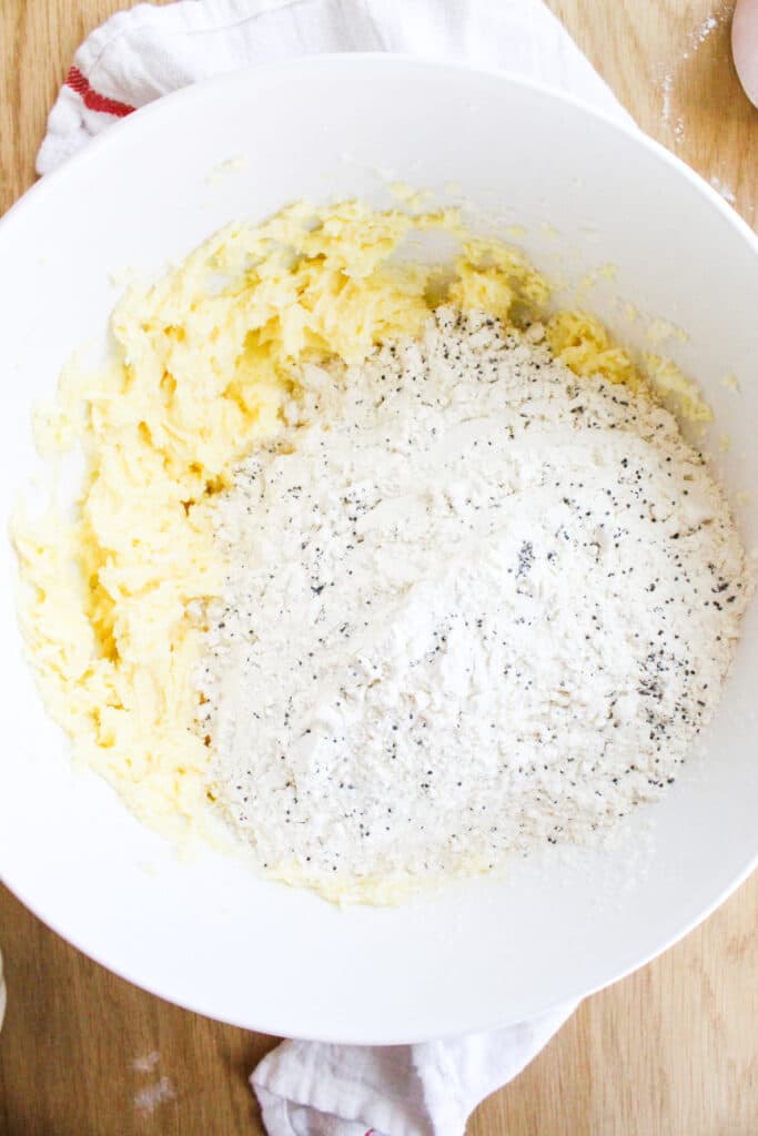 Adding the dry ingredients for Poppyseed Cookies