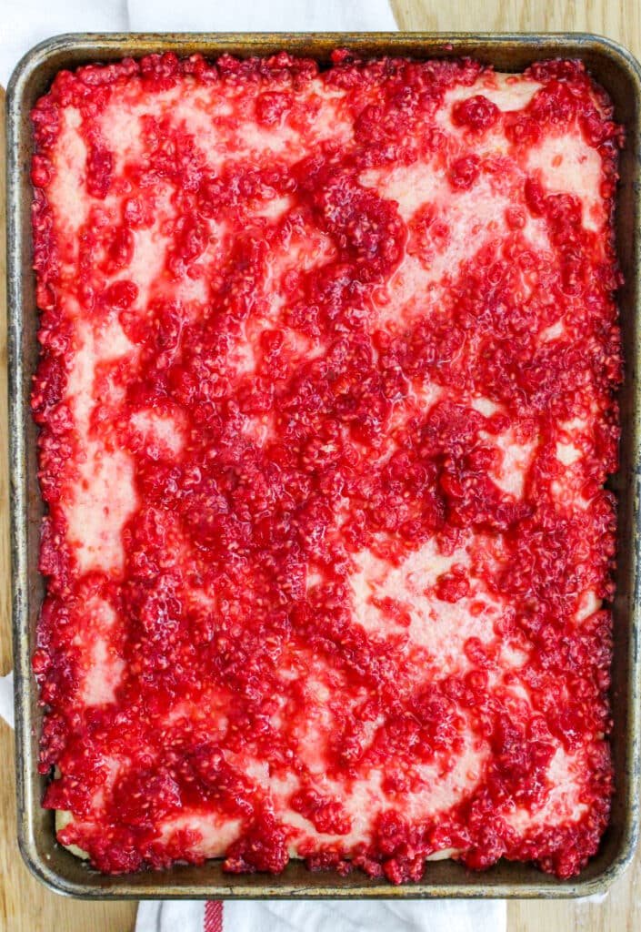 Raspberry topping on lemon raspberry sheet cake